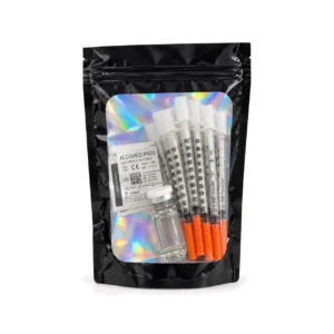 Kit de reconstitution LooksLabs dans son sachet noir à fenêtre holographique : eau bactériostatique, seringues à insuline 1 mL et tampons alcoolisés